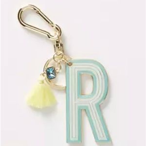 Anthropologie keychain letter R. New in the box.